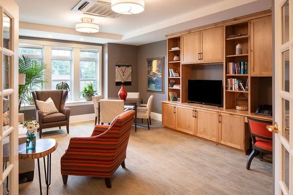 Bright common area with seating and decor