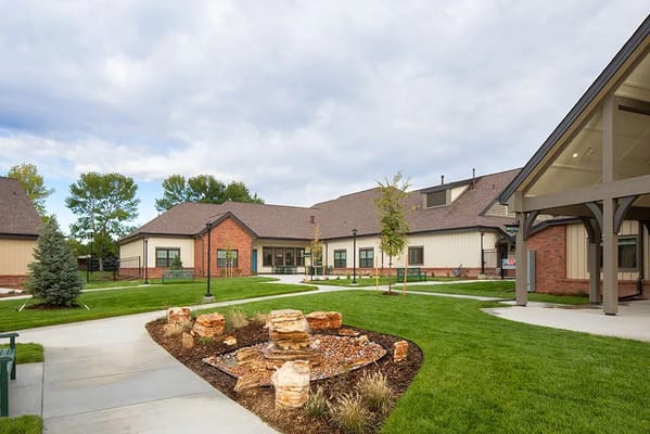 Outdoor view of a senior living facility with landscaping