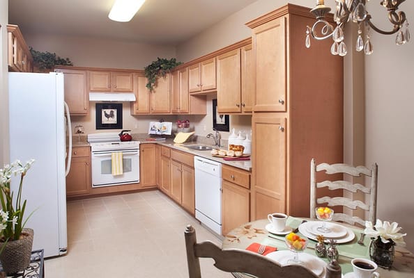 Well-equipped kitchen in a senior living unit