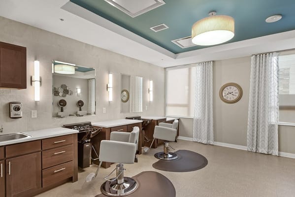 Salon area with salon chairs and mirrors