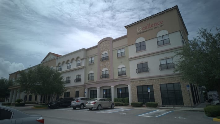 Exterior view of Excellence Senior Living facility