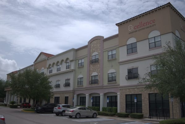 Exterior view of Excellence Senior Living facility in Orlando