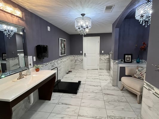 Stylish restroom interior with elegant lighting and decor