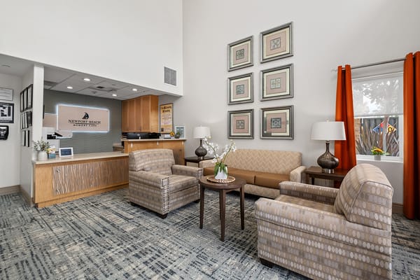 Bright lobby area with seating and reception desk