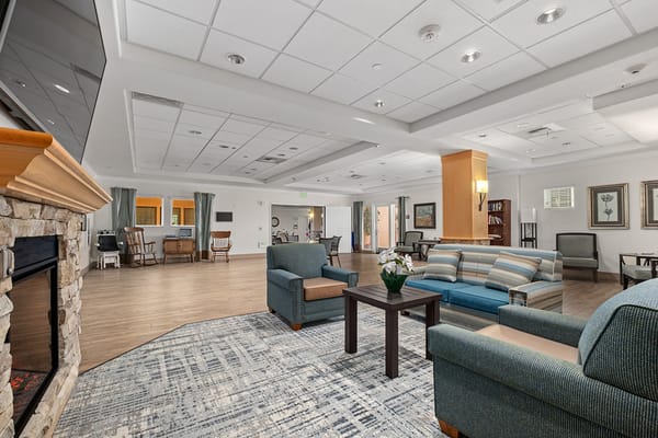 Interior view of a cozy common area with seating