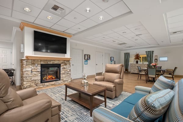 Interior common area with fireplace and seating