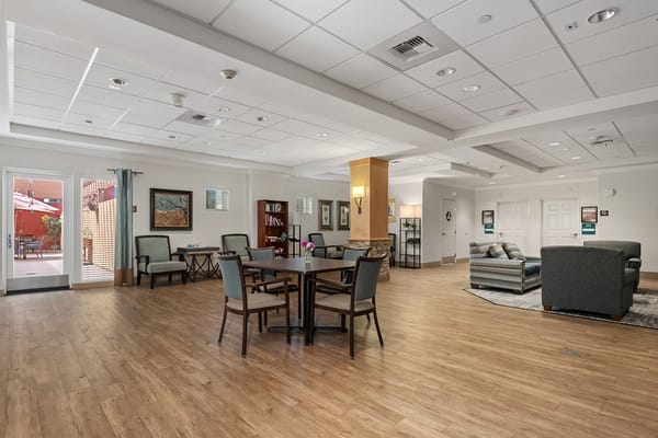 Bright common area with seating and artwork