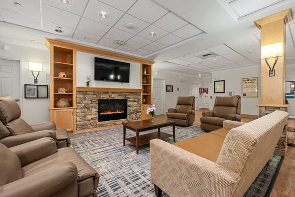 Cozy common area with seating and fireplace