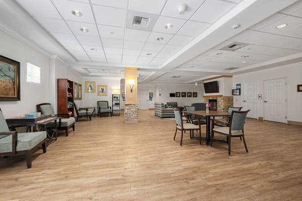 Bright common area with seating and artwork