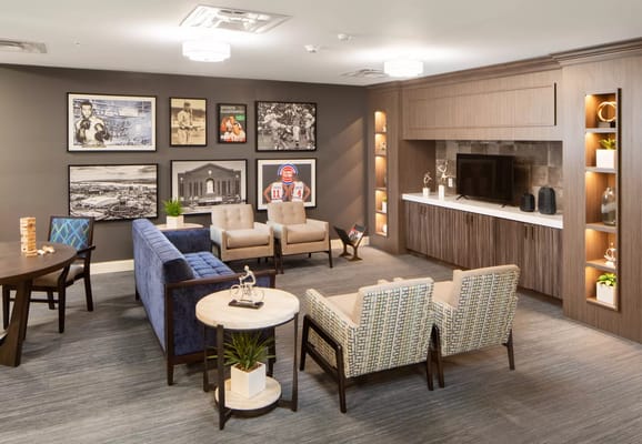 Bright common area with comfortable seating and artwork