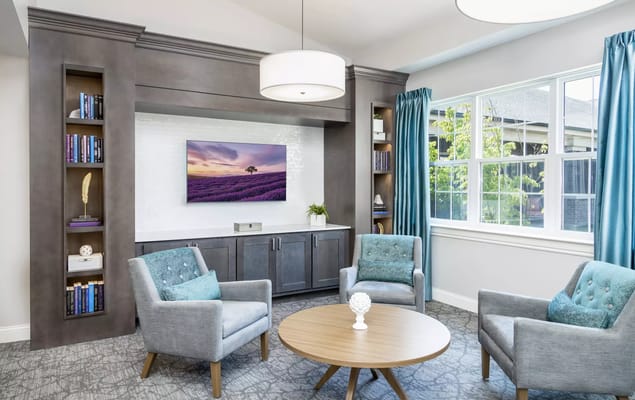 Bright and welcoming common area with seating and decor