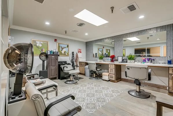 Beauty salon interior with styling chairs and mirrors