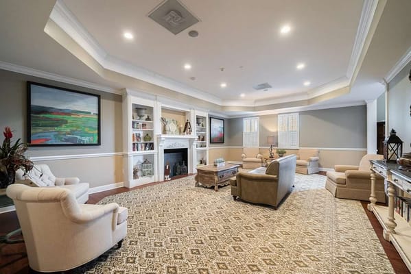 Cozy common area with comfortable seating and art