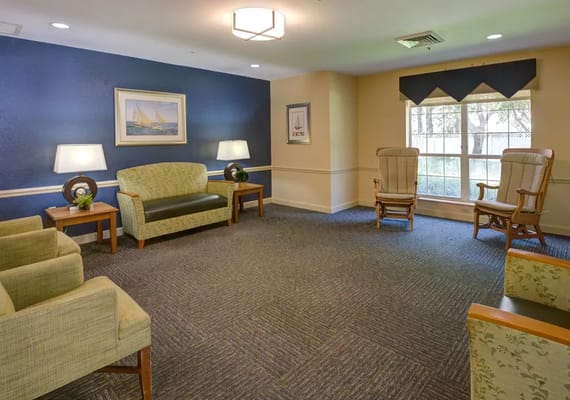 Bright common area with seating and natural light