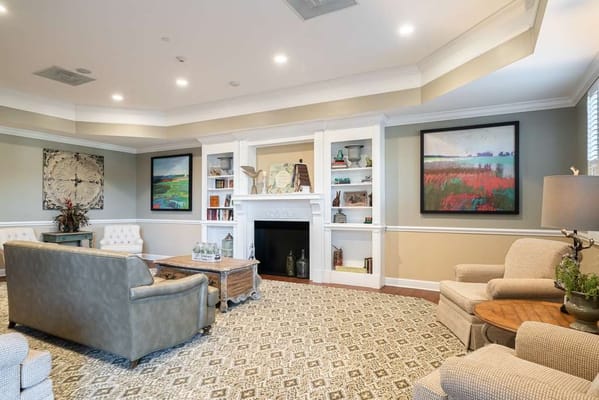 Cozy common area with comfortable seating and art