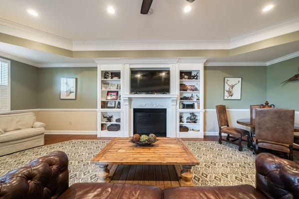 Cozy common area with seating and a fireplace