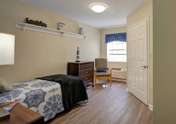 A cozy, well-furnished resident room