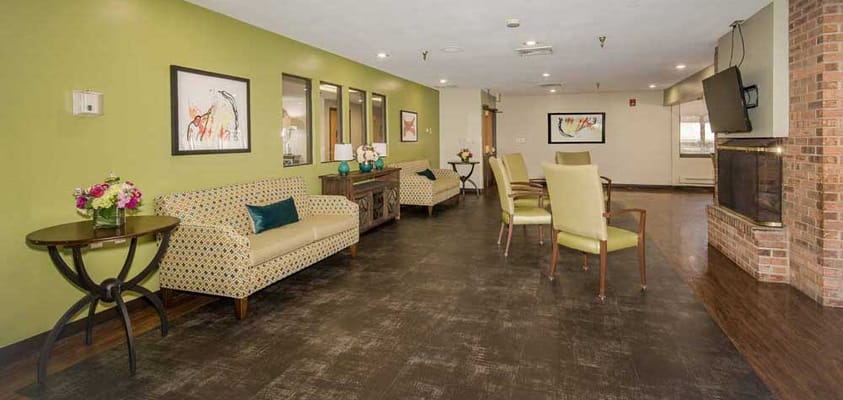 Bright common area with seating and artwork