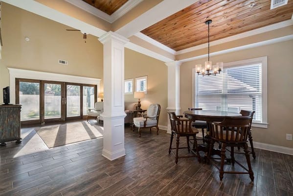 Bright interior common area with dining table