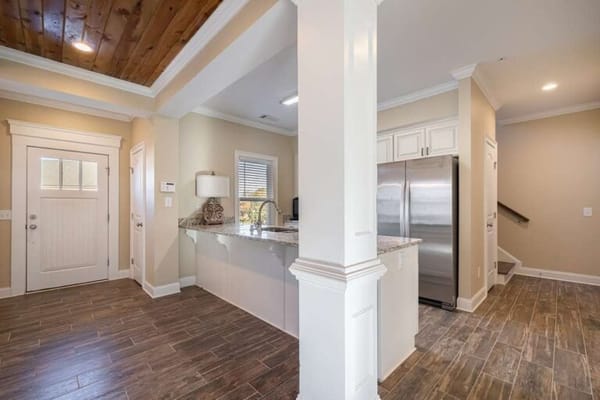 Interior view of a modern kitchen and hallway