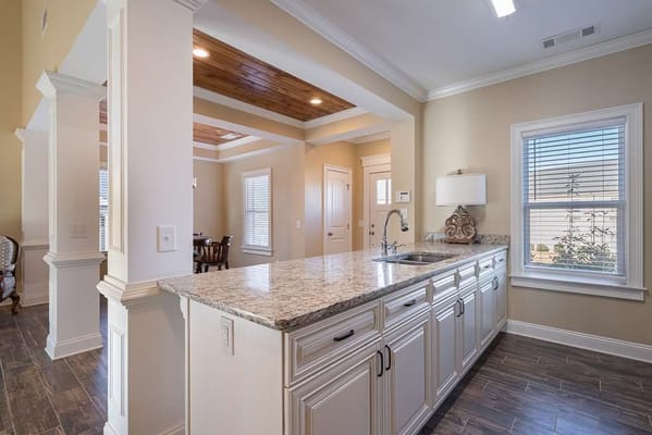 Interior view of a well-lit kitchen and dining area