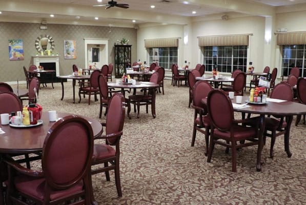 Dining room setup with tables and food service items