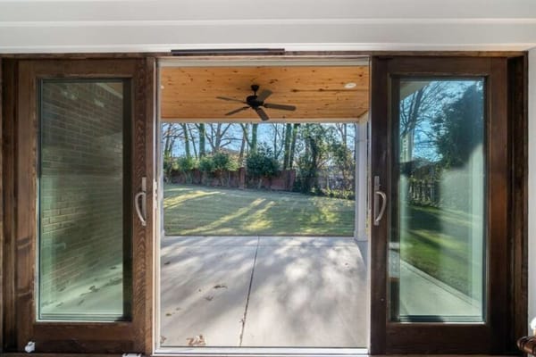 View of a spacious outdoor area with patio