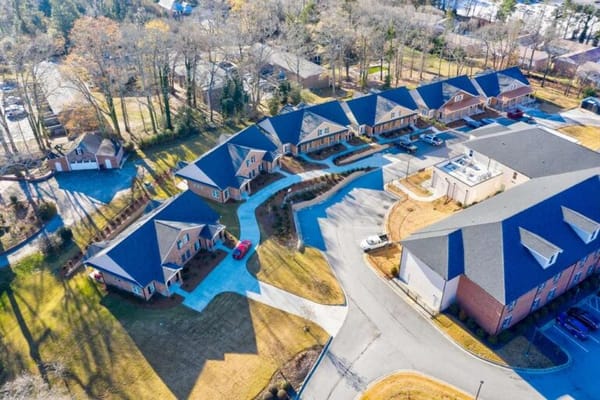 Aerial view of a senior living campus with cottages