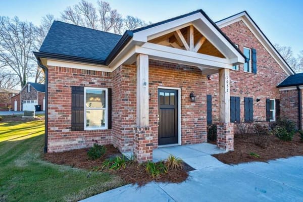Exterior view of a brick senior living facility