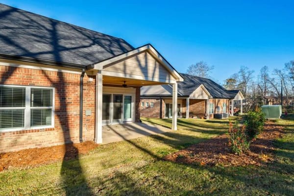 Exterior view of single-story senior living cottages