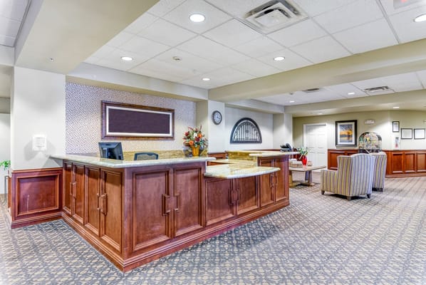 Reception area of a senior living facility with a warm ambiance