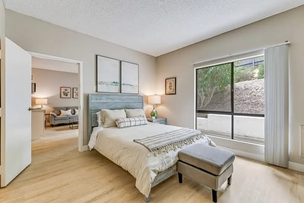 Bright private room with a bed and window