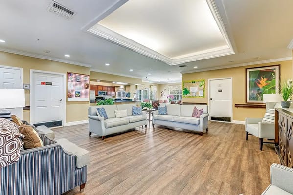 Bright common area with seating and decorations