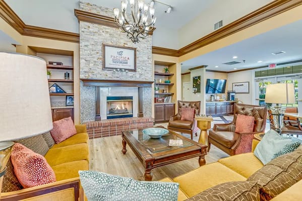 Cozy common area with comfortable seating and fireplace