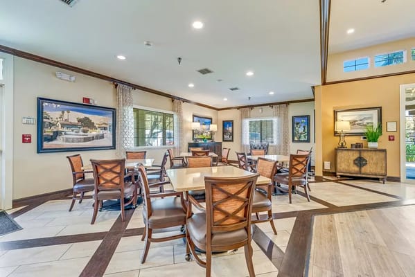 Bright dining room with tables and chairs