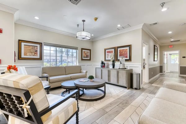 Cozy common area with comfortable seating and artwork