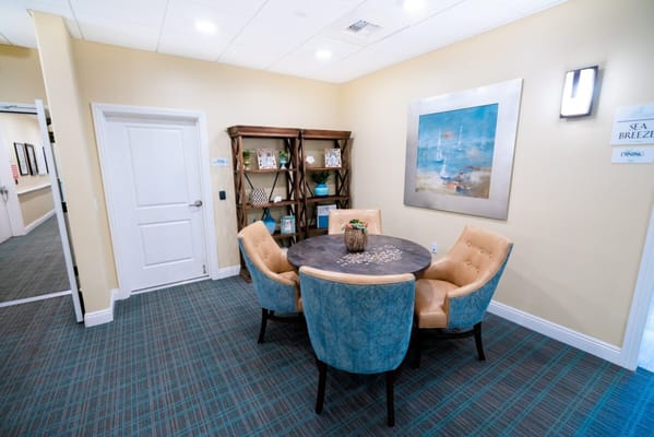 Cozy seating area with a round table in an interior space