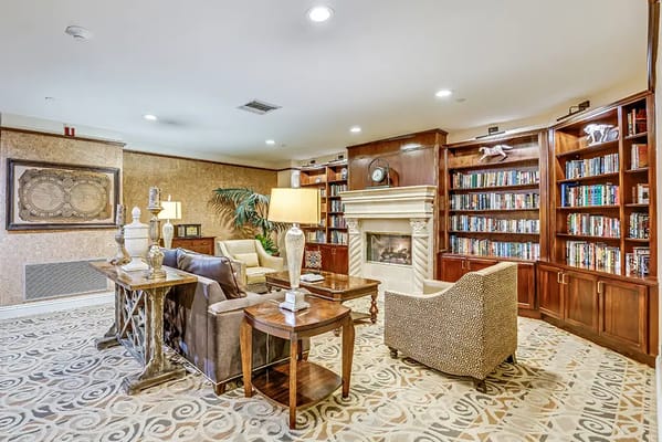 Cozy common area with bookshelves and seating
