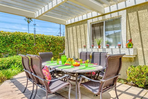 Outdoor dining area with table and chairs