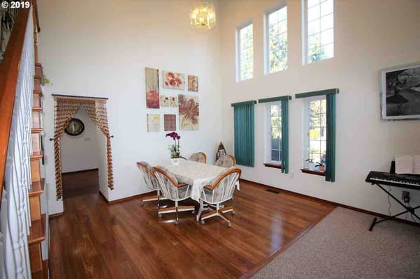 Cozy dining area with a large table and natural light