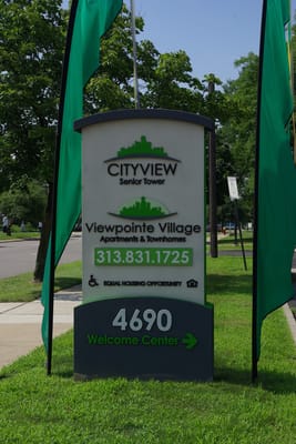 Exterior sign for Cityview Senior Tower announcing the Welcome Center