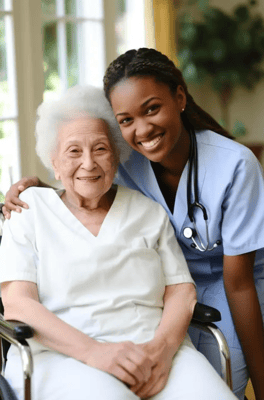 A caregiver smiling with a senior resident in a bright room
