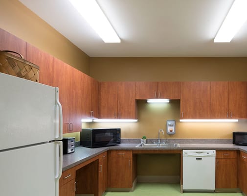 Bright kitchen area with modern appliances