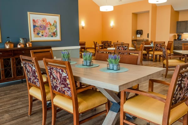 Dining room with tables and floral decor
