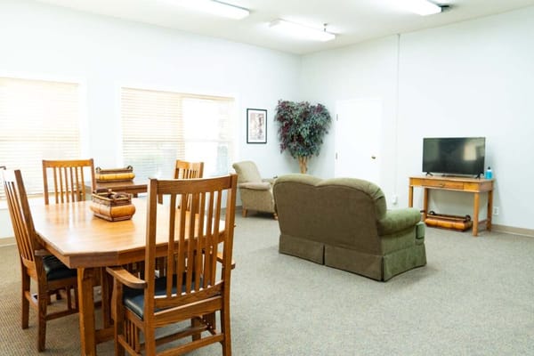 Interior view of a cozy communal area with furniture