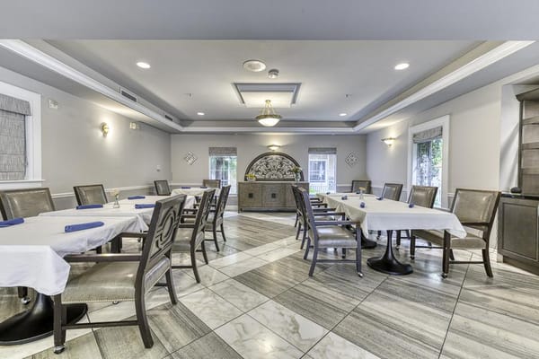 Dining area with elegant seating and decor