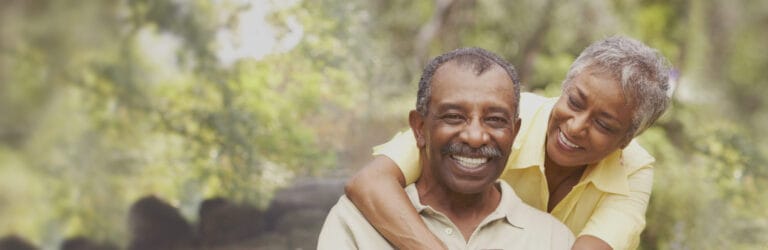 A couple enjoying time outdoors in a natural setting