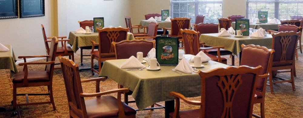 Dining area with tables set for meal service