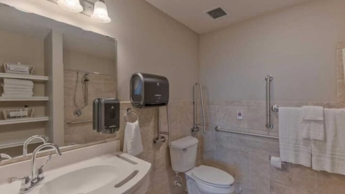 Clean, accessible bathroom with safety features