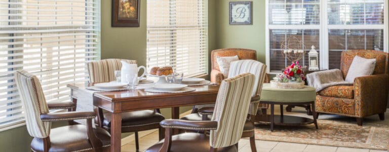 Cozy interior common area with seating and dining table